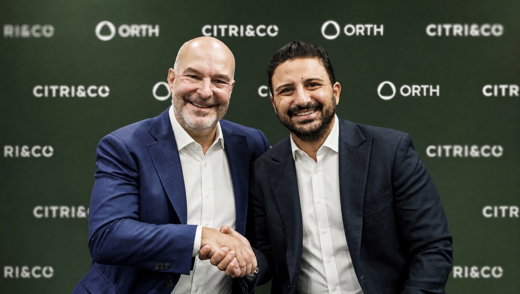 Carlos Blanc, CEO of Citri&Co, and Hassan Fayed, Founder and CEO of ORTH, shake hands to mark the partnership.